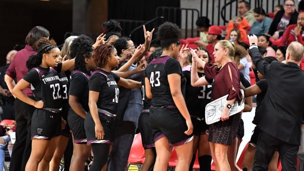 Mansfield Timberview huddles up during their game against Lubbock-Monterey during the Region I-5A Girls Basketball Tournament at Kay Yeager on Friday, February 24, 2023. 